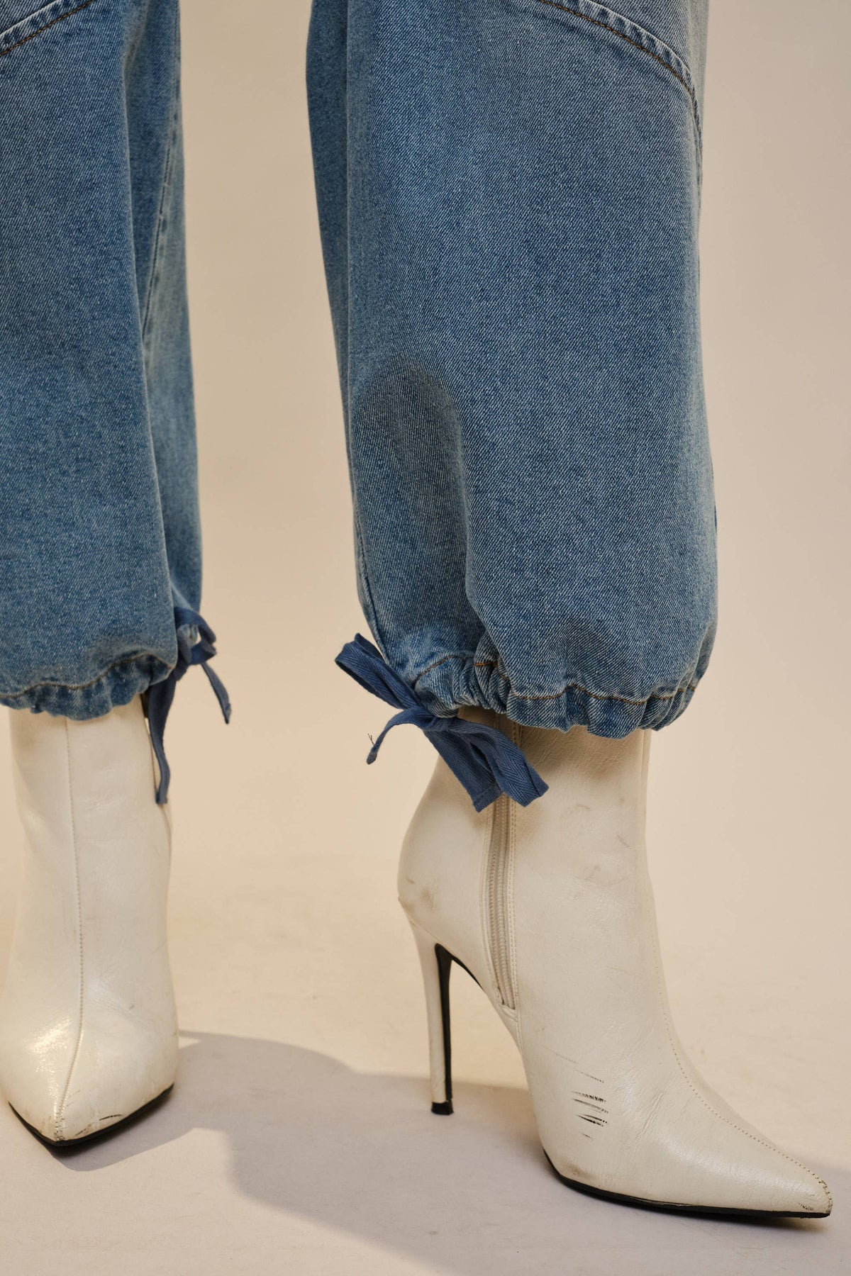 Metal Stud Drawstring Hem Jeans